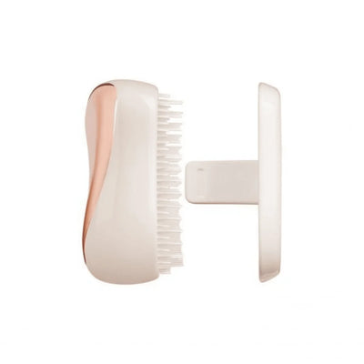 Tangle Teezer Compact Styler detangling brush is the best brush to take with you on the go. This travel-friendly detangling hairbrush smooths, shines and defines on-the-go.  (3)