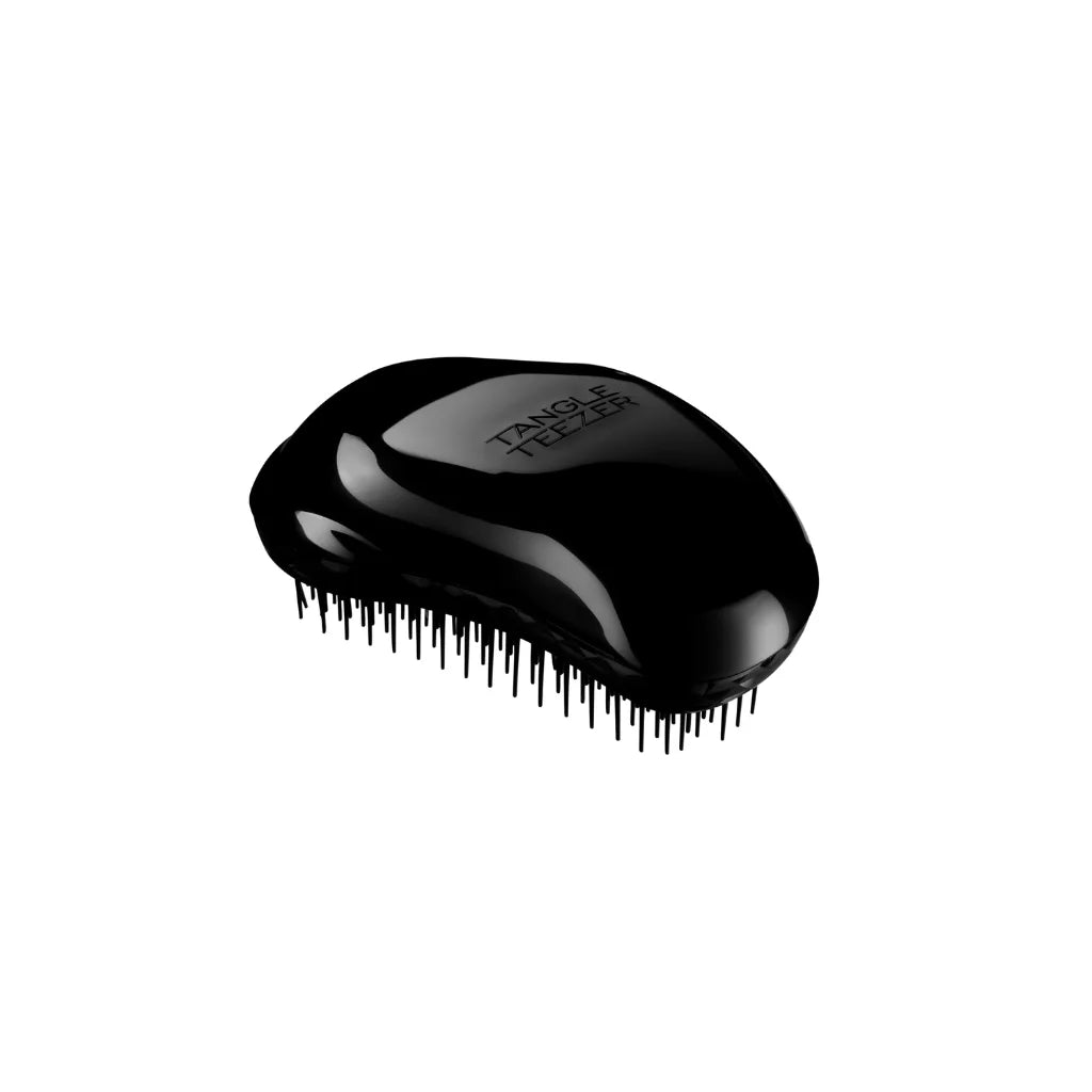 The Original Tangle Teezer Detangling brush detangles wet or dry hair with its two-tiered regular-flex teeth which glide through the hair with no pulling, it leaves hair super-smooth and tangle-free. Prevents hair breakage (3)